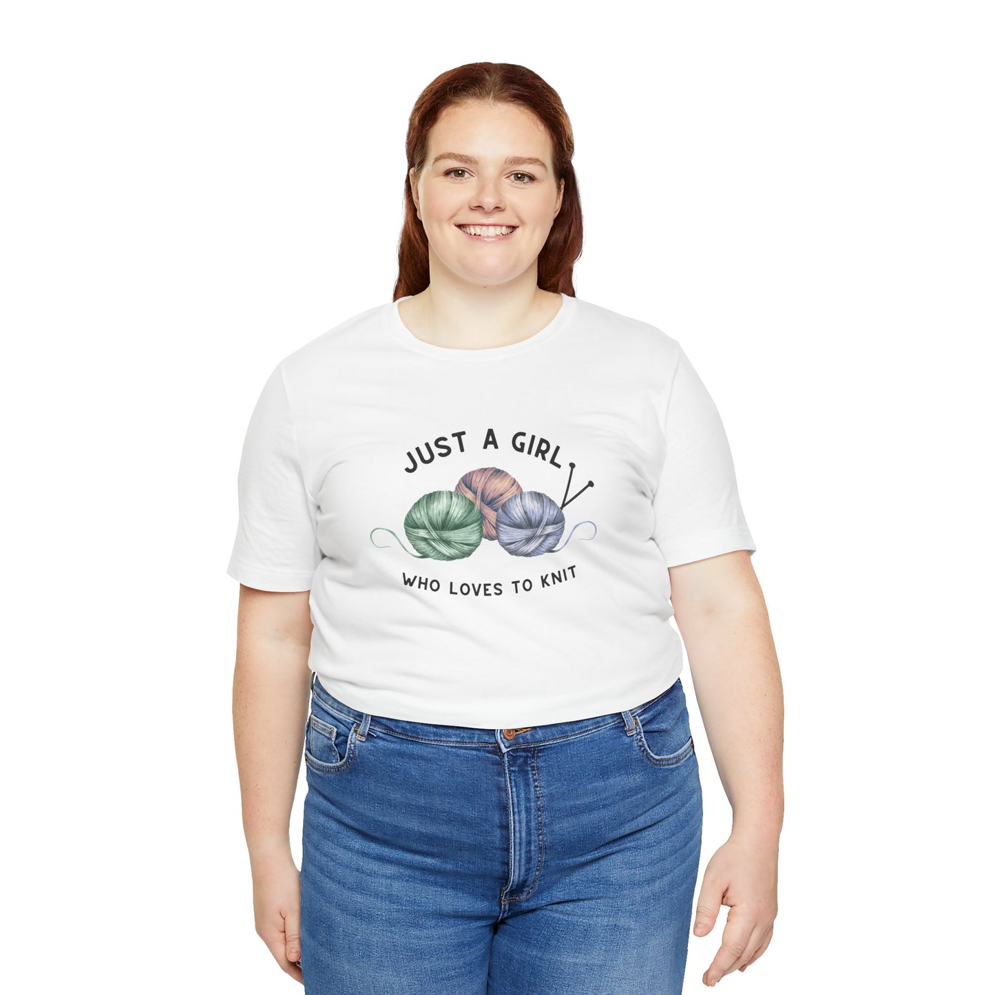 Funny Knitting T-Shirt- Just a Girl Who Loves to Knit, white shirt with black letters, 3 balls of yarn with knitting needles worn by woman