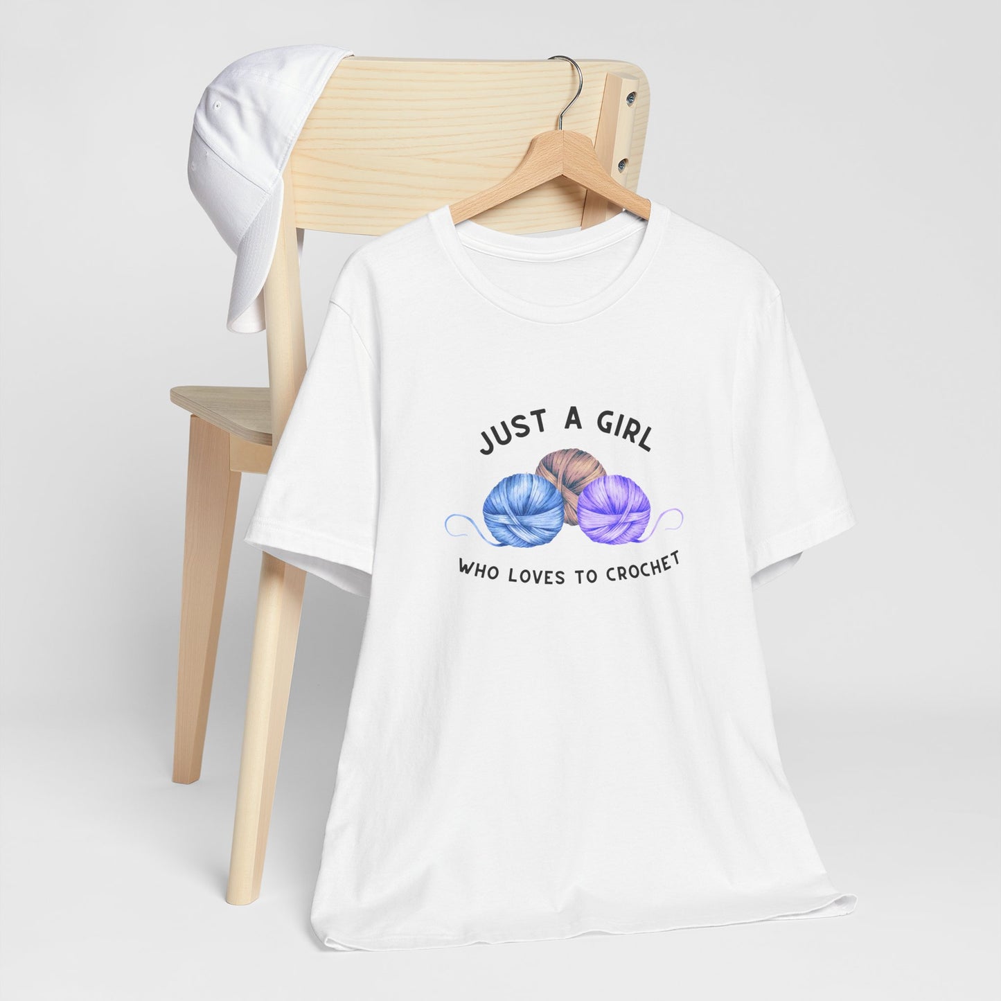 Funny Crochet T-Shirt Just a Girl Who Loves to Crochet Shirt white shirt with black letters and three balls of yarn