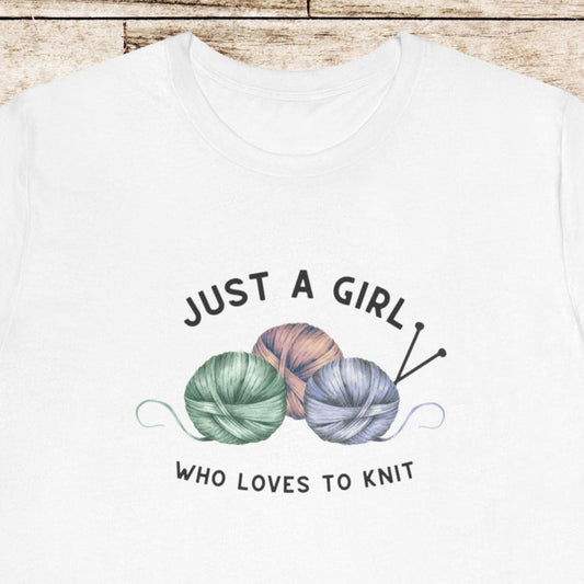Funny Knitting T-Shirt- Just a Girl Who Loves to Knit, white shirt with black letters, 3 balls of yarn with knitting needles