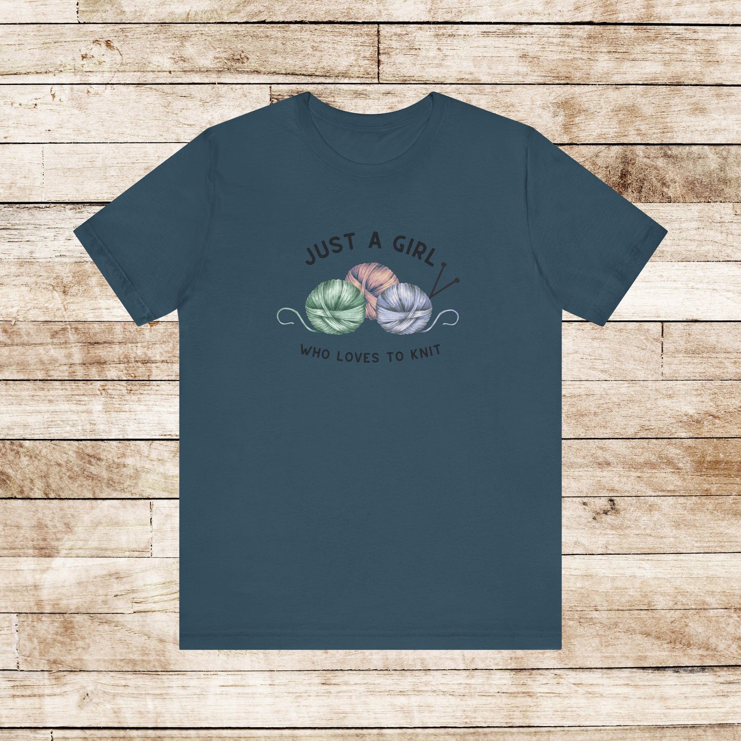 Funny Knitting T-Shirt- Just a Girl Who Loves to Knit, deep teal shirt with black letters, 3 balls of yarn with knitting needles