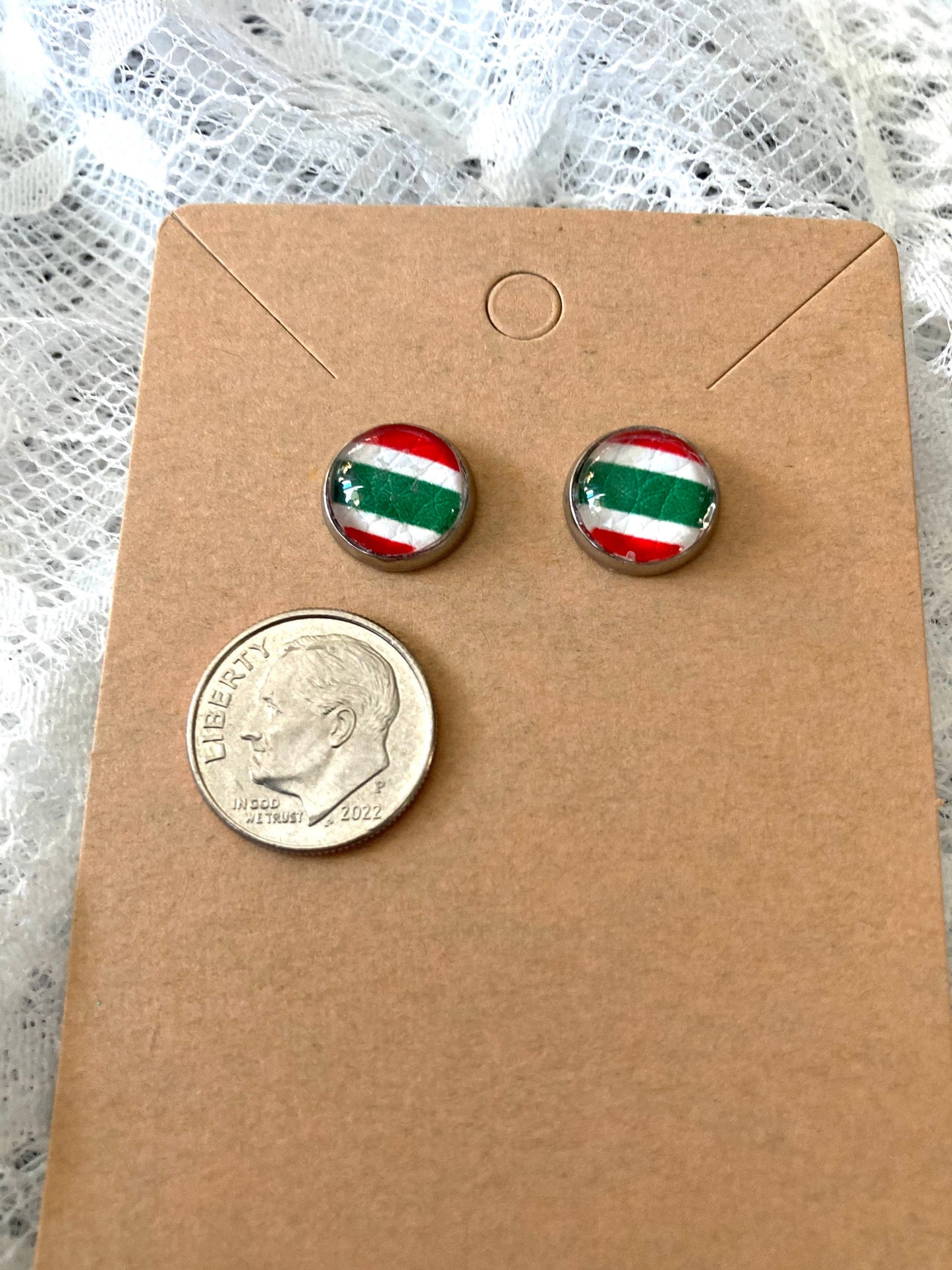round stud earrings with red, white, and green stripes faux leather center with dime to show size