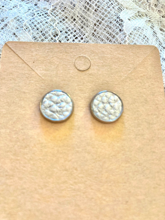 round stud earrings with a shiny silver faux leather center