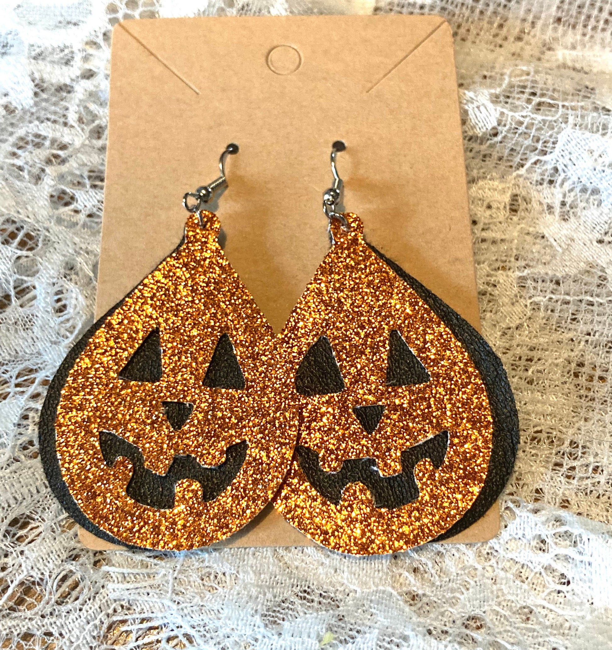 Jack-o-lantern Faux Leather Teardrop Earrings double layer- black under layer with sparkly orange jack o lantern overlay