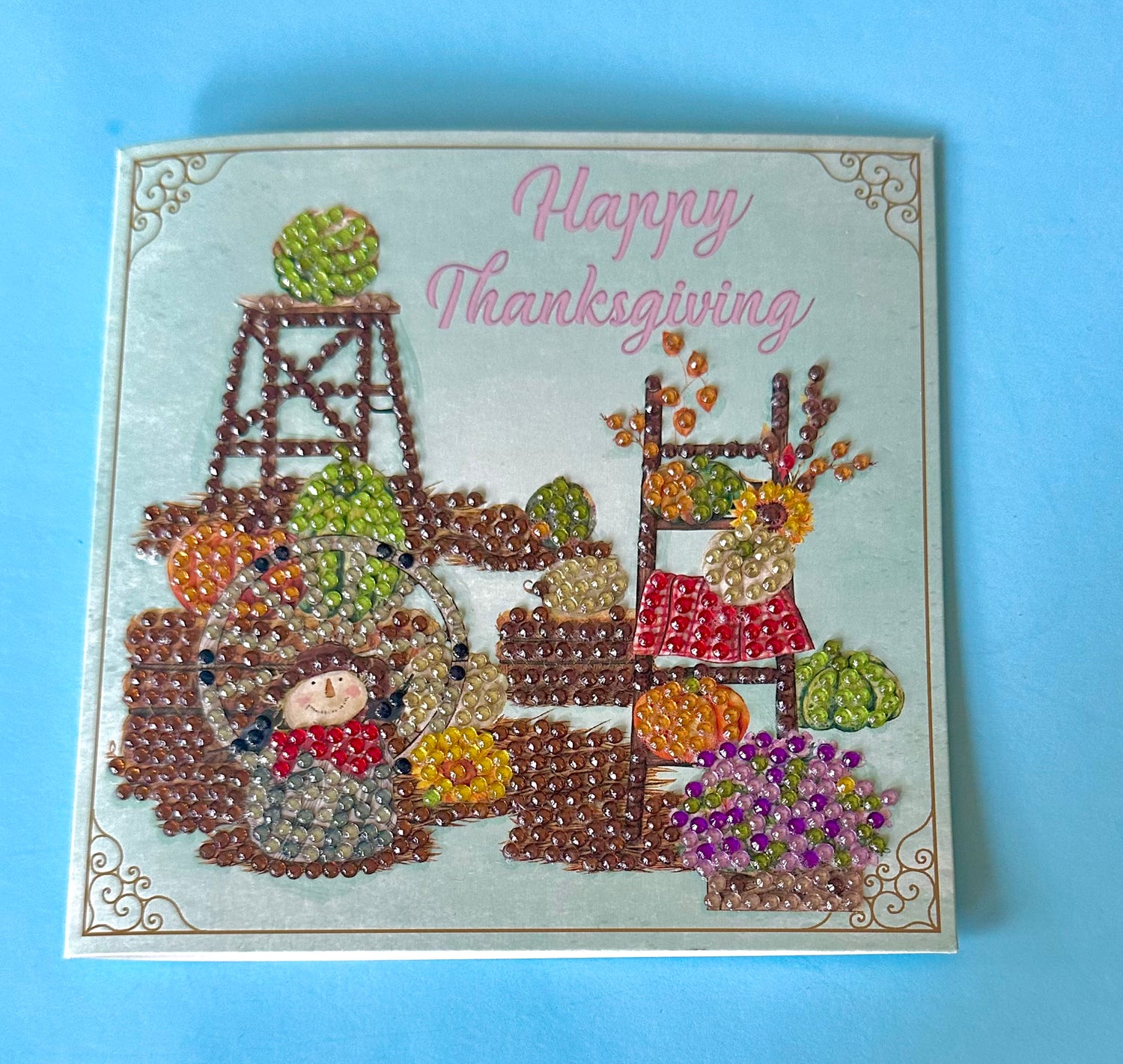 Decorative 6x6 Thanksgiving card with diamond dot art on a blue background